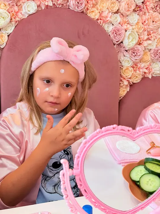 A gentle face mask and a fluffy pink headband