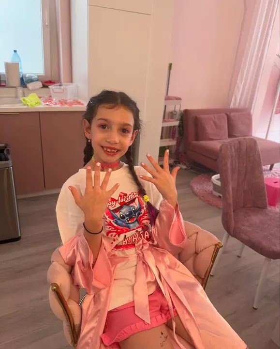 Freshly done nails in her favourite polish
