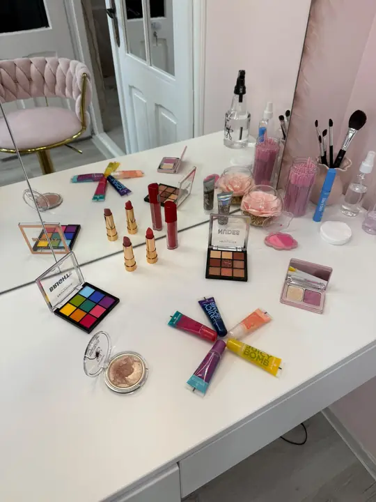 The make-up table: eyeshadows, lipsticks and brushes for princesses